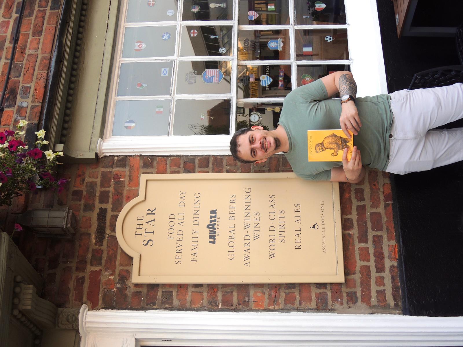 Thomas Forster holding The Old Man outside The Star in Hoddesdon